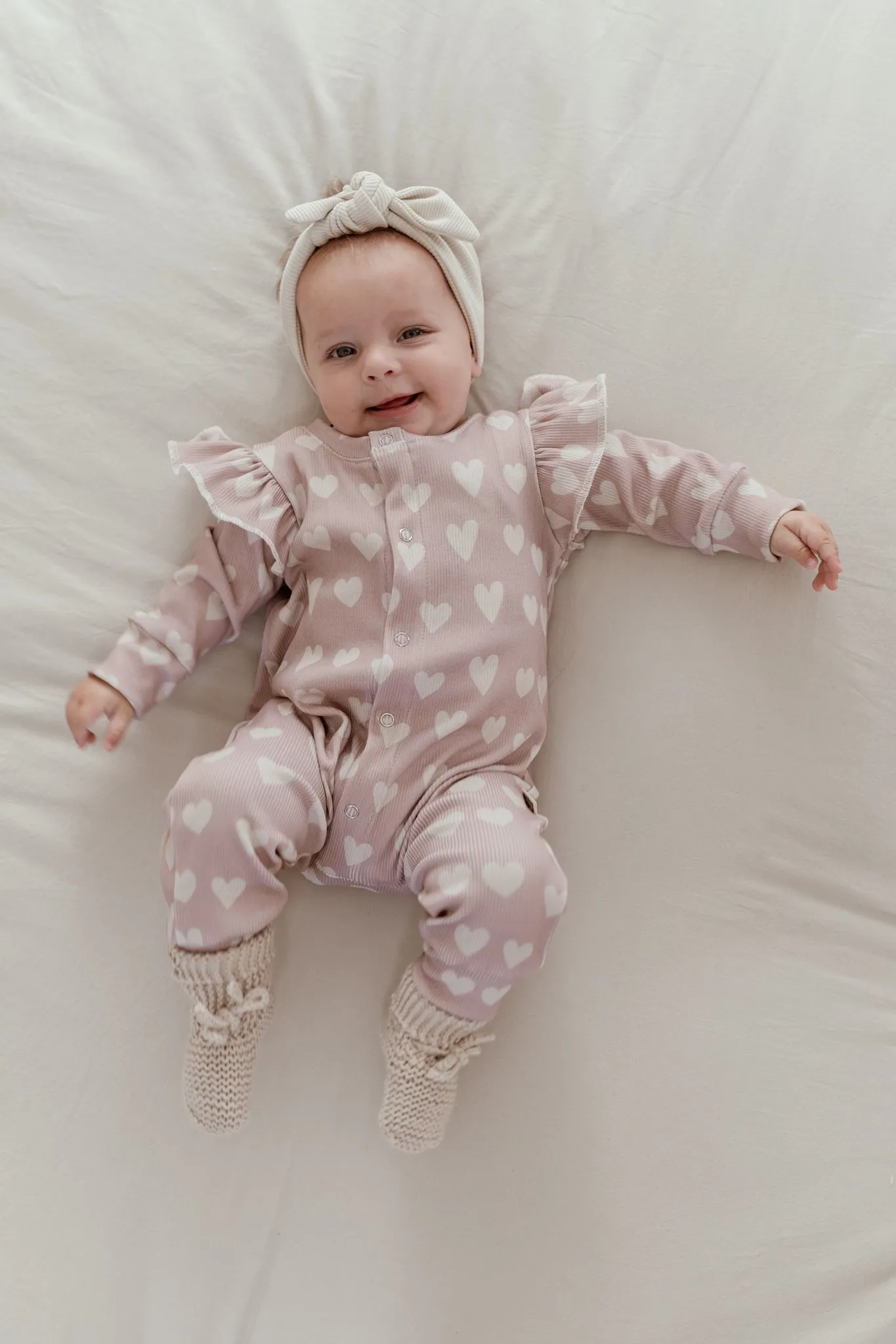 Baby Jumpsuit Rib Hartjes Roze met Ruffles