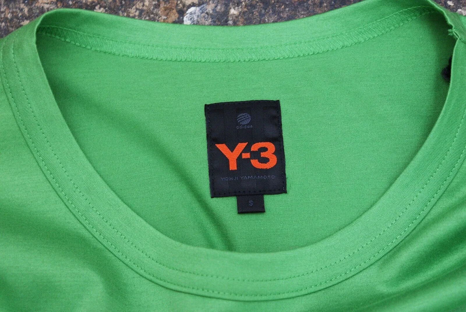 Green Long Sleeved T Shirt With Logo On Back