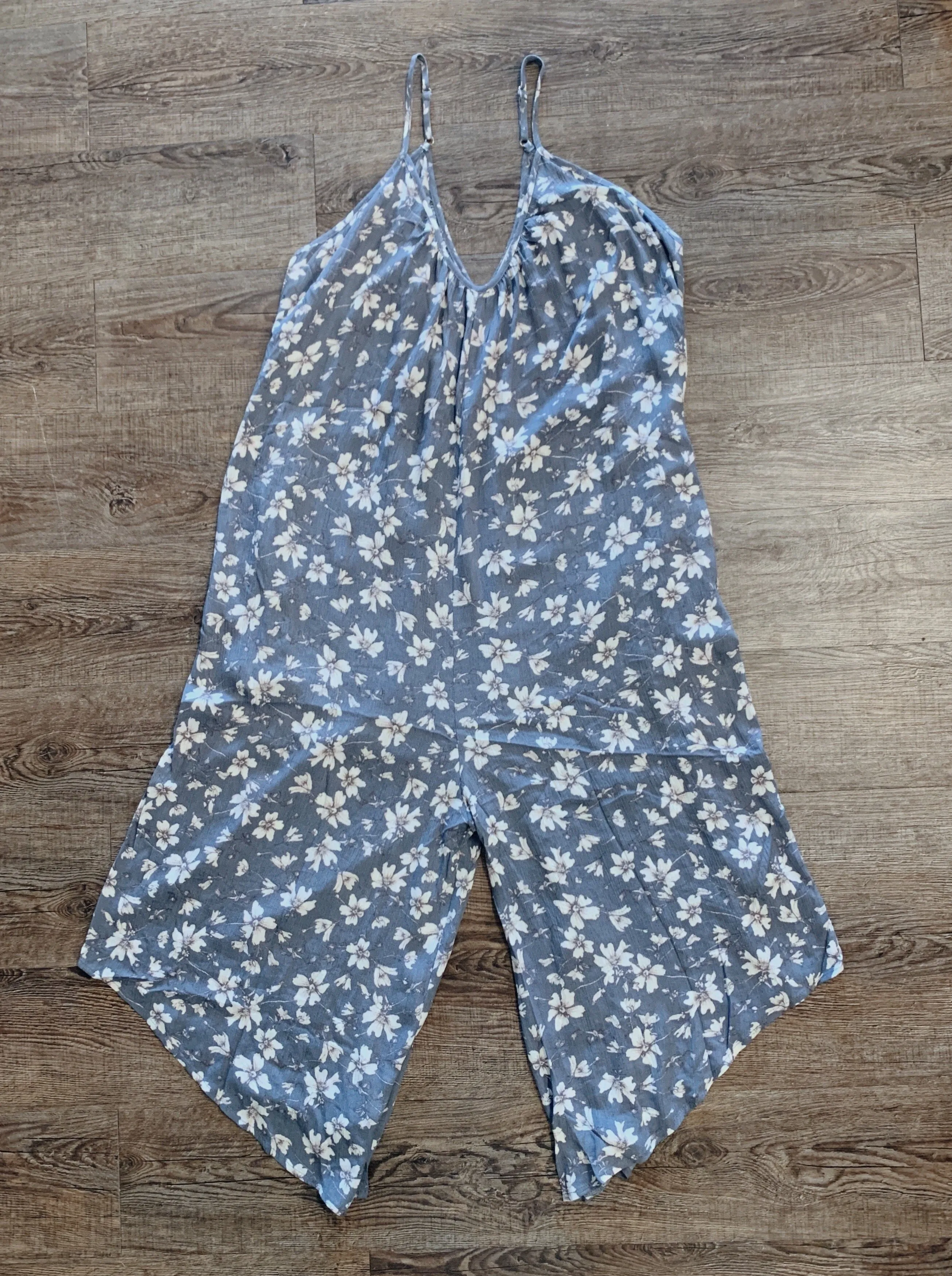 Loose Fitting Jumpsuit with a Floral Print in Grey