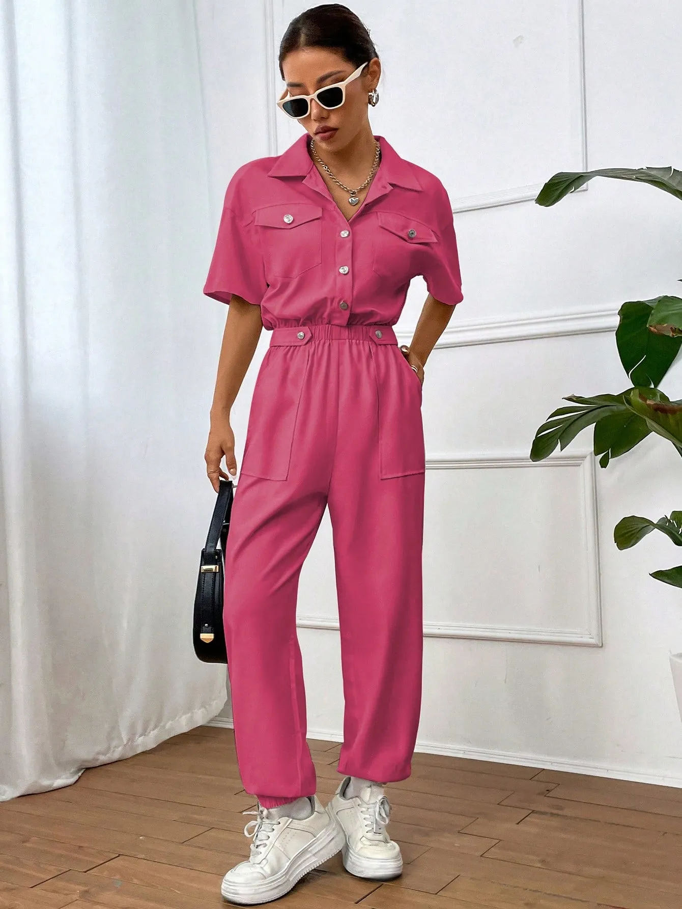 Solid Color Jumpsuit With Pockets And Front Button Placket SS24