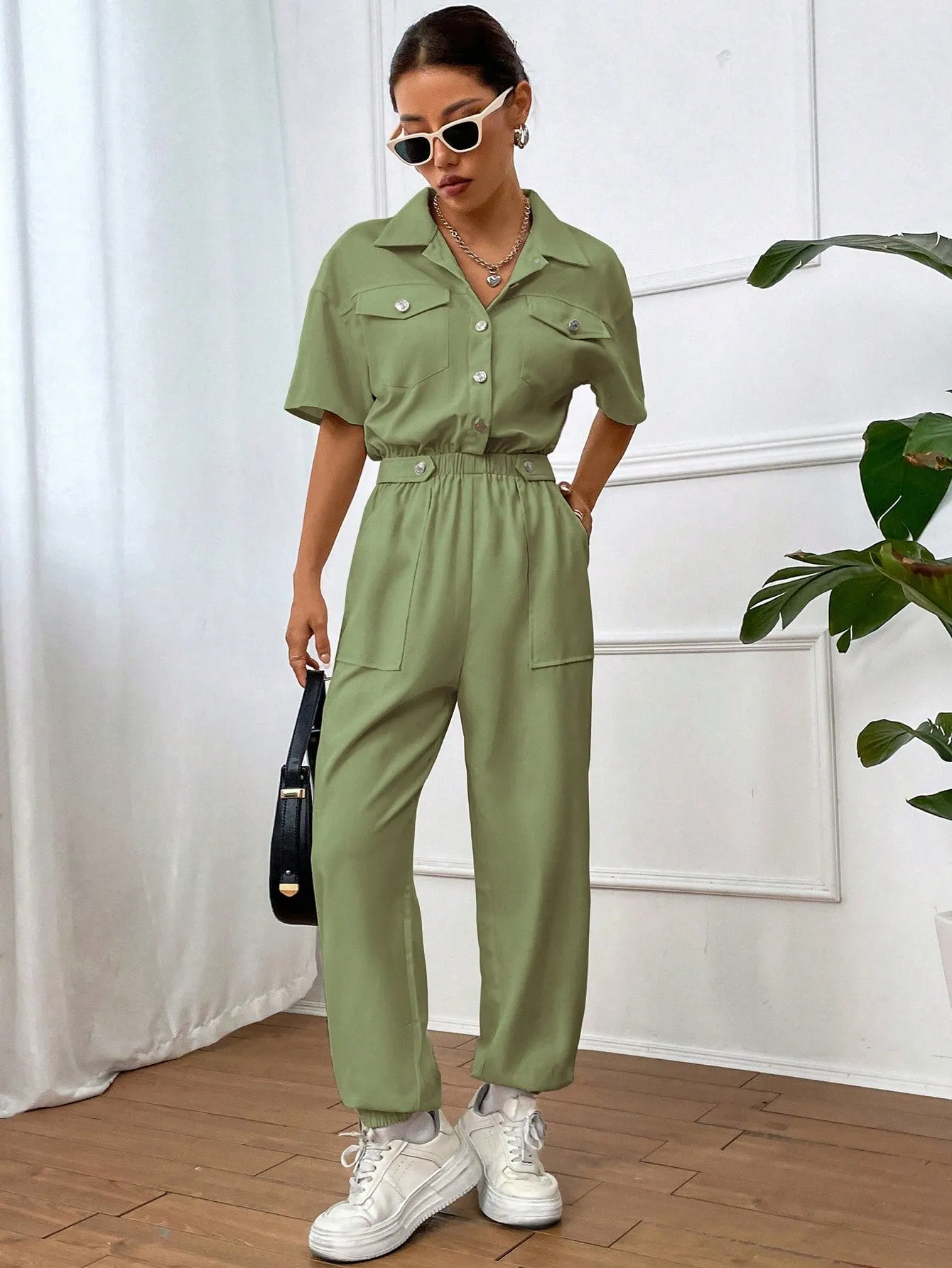 Solid Color Jumpsuit With Pockets And Front Button Placket SS24