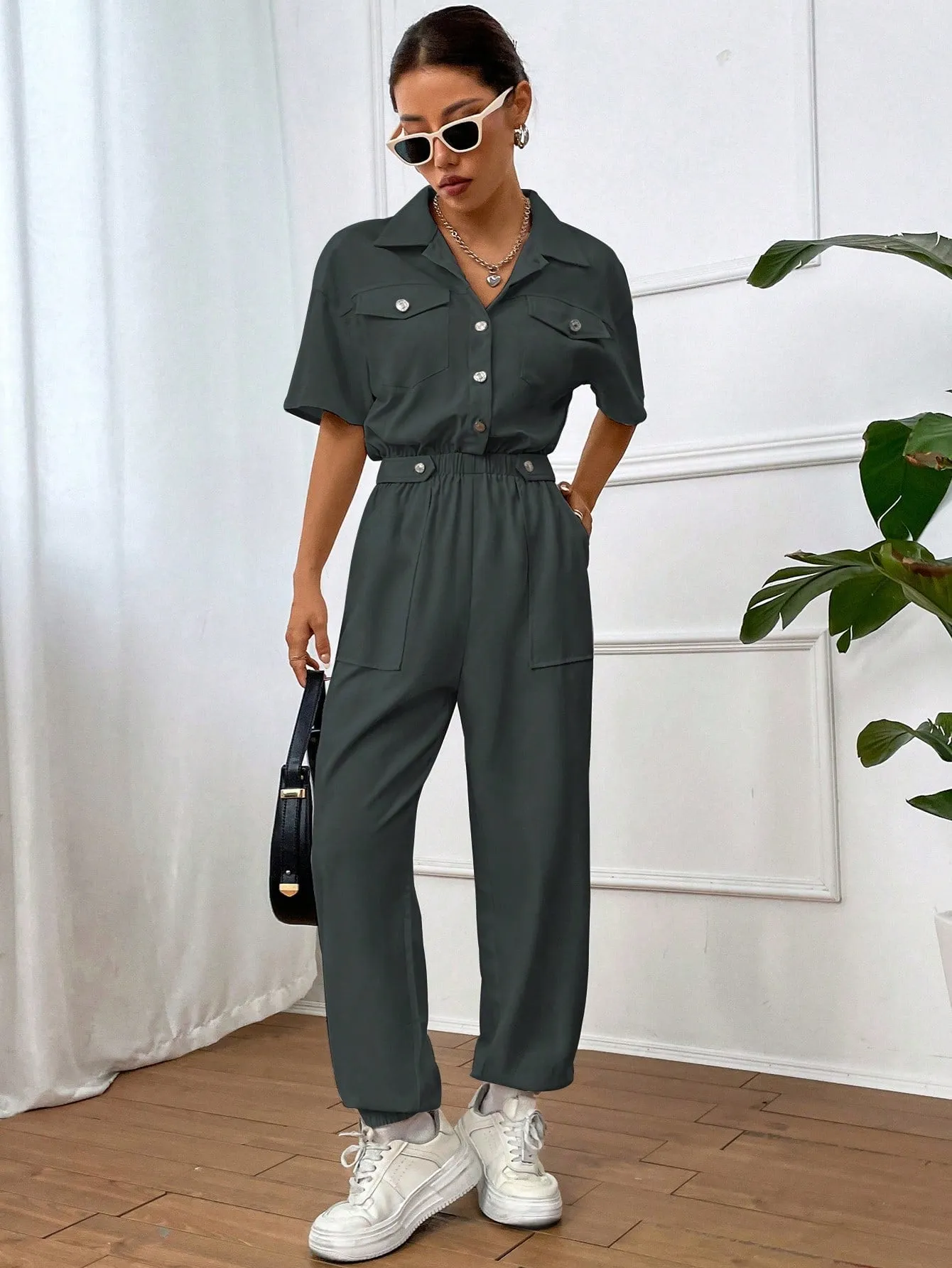 Solid Color Jumpsuit With Pockets And Front Button Placket SS24