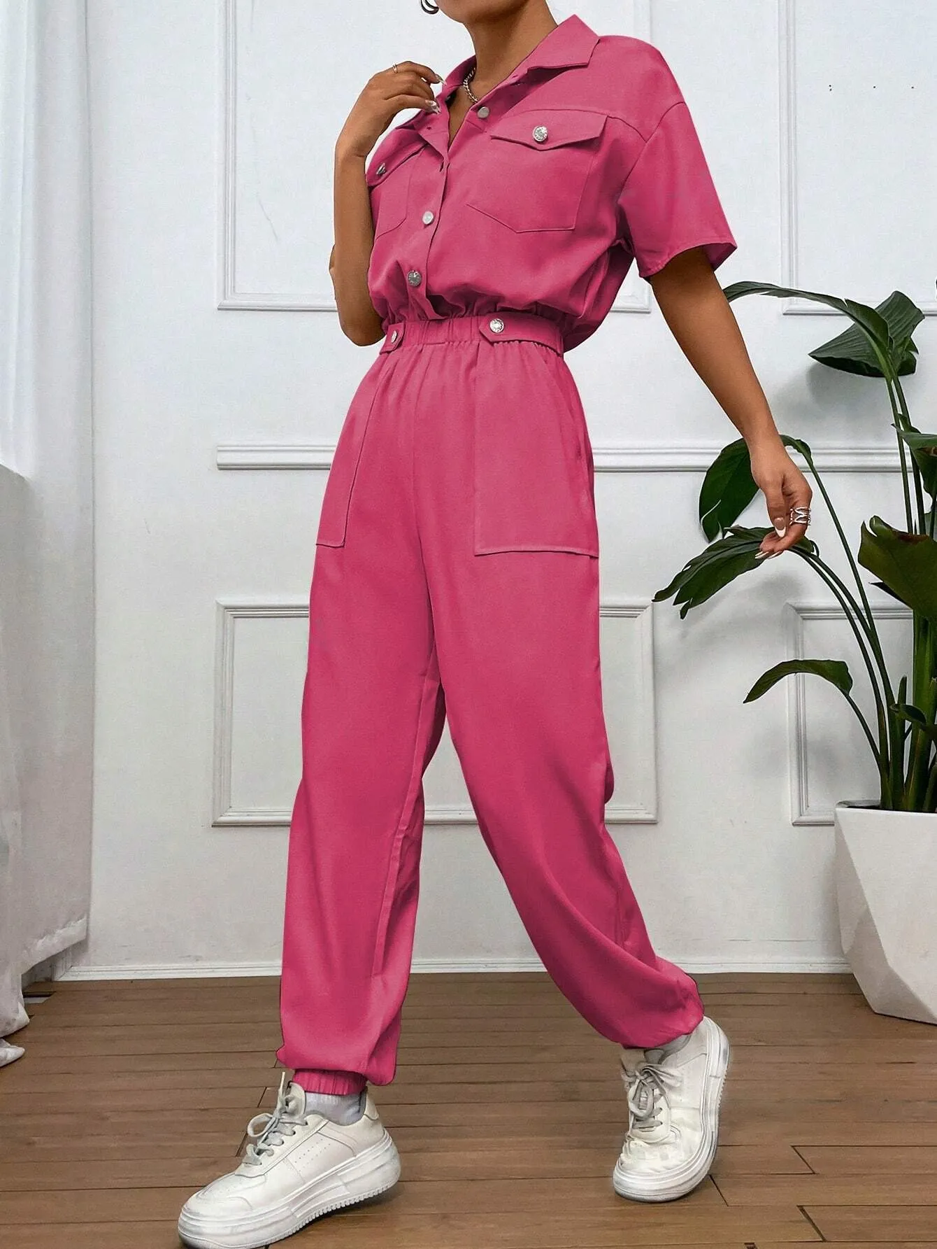 Solid Color Jumpsuit With Pockets And Front Button Placket SS24